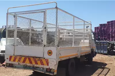 Nissan Dropside trucks Nissan UD35 Dropside with mesh 2010 for sale by D and O truck and plant | AgriMag Marketplace