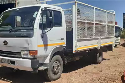 Nissan Dropside trucks Nissan UD35 Dropside with mesh 2010 for sale by D and O truck and plant | Truck & Trailer Marketplace