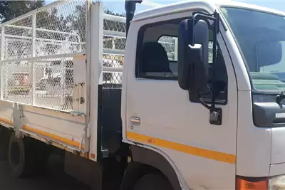 Nissan Dropside trucks Nissan UD35 Dropside with mesh 2010 for sale by D and O truck and plant | AgriMag Marketplace
