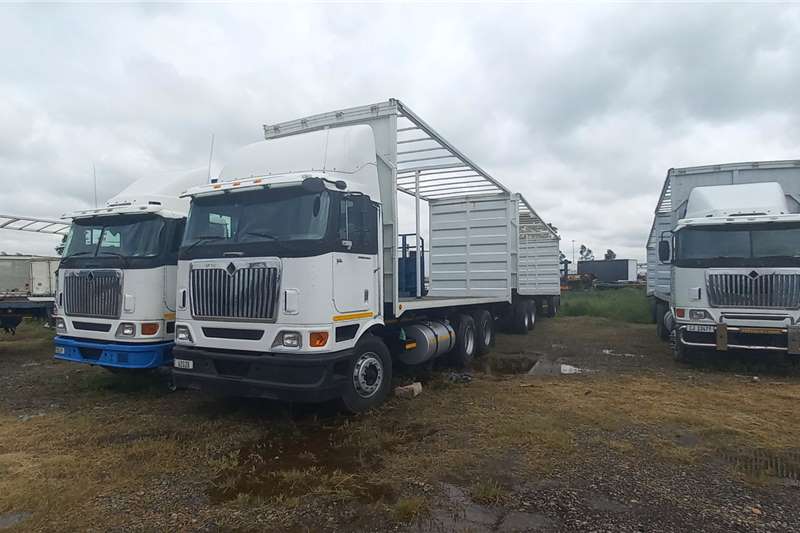 International Rigid truck Curtain side 9800i with curtain side trailer for sale by AAG Motors | Truck & Trailer Marketplace