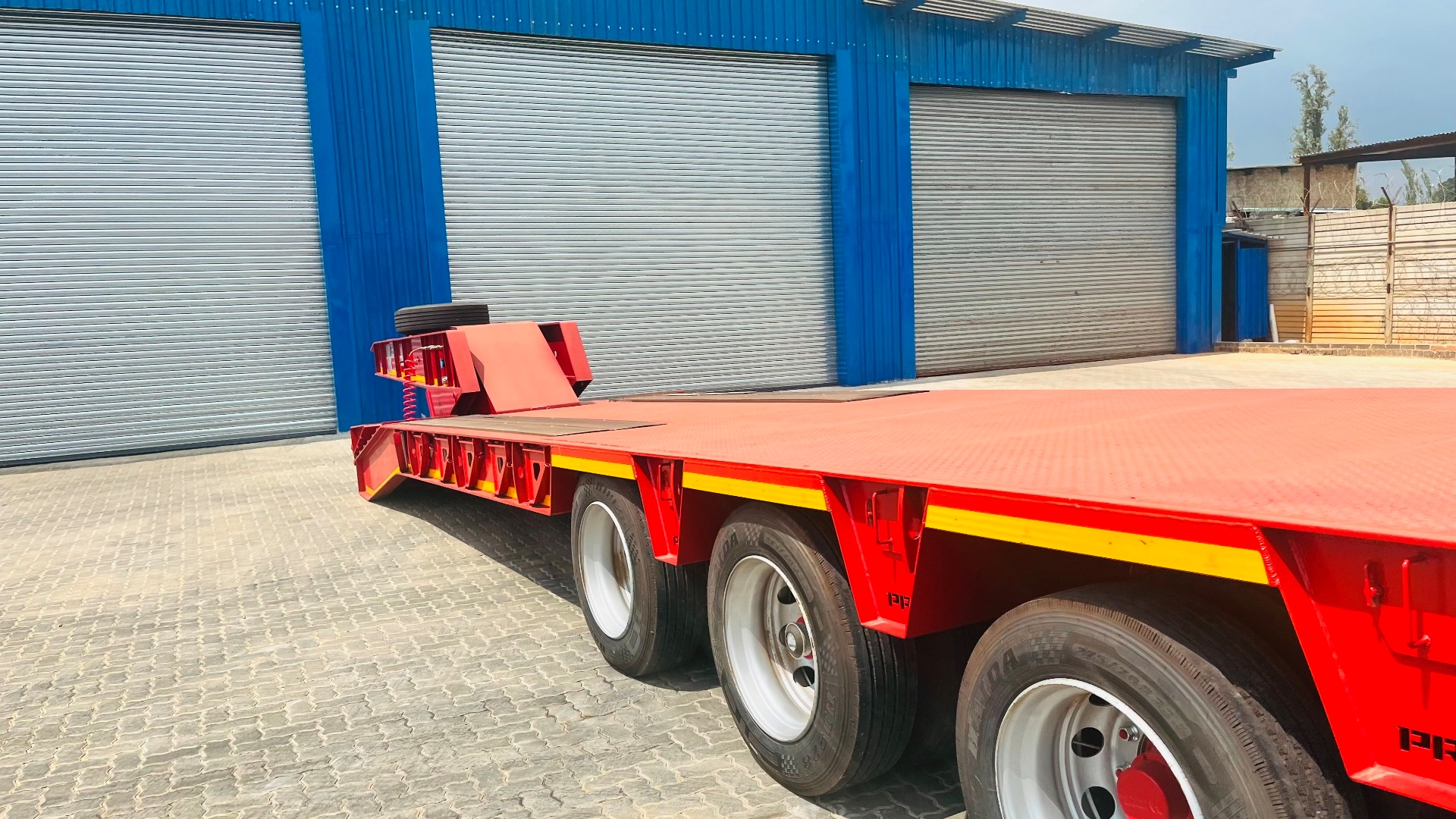 PR Trailers Trailers Slope deck HYDRAULIC QUAD AXLE 2022 for sale by Pomona Road Truck Sales | Truck & Trailer Marketplaces