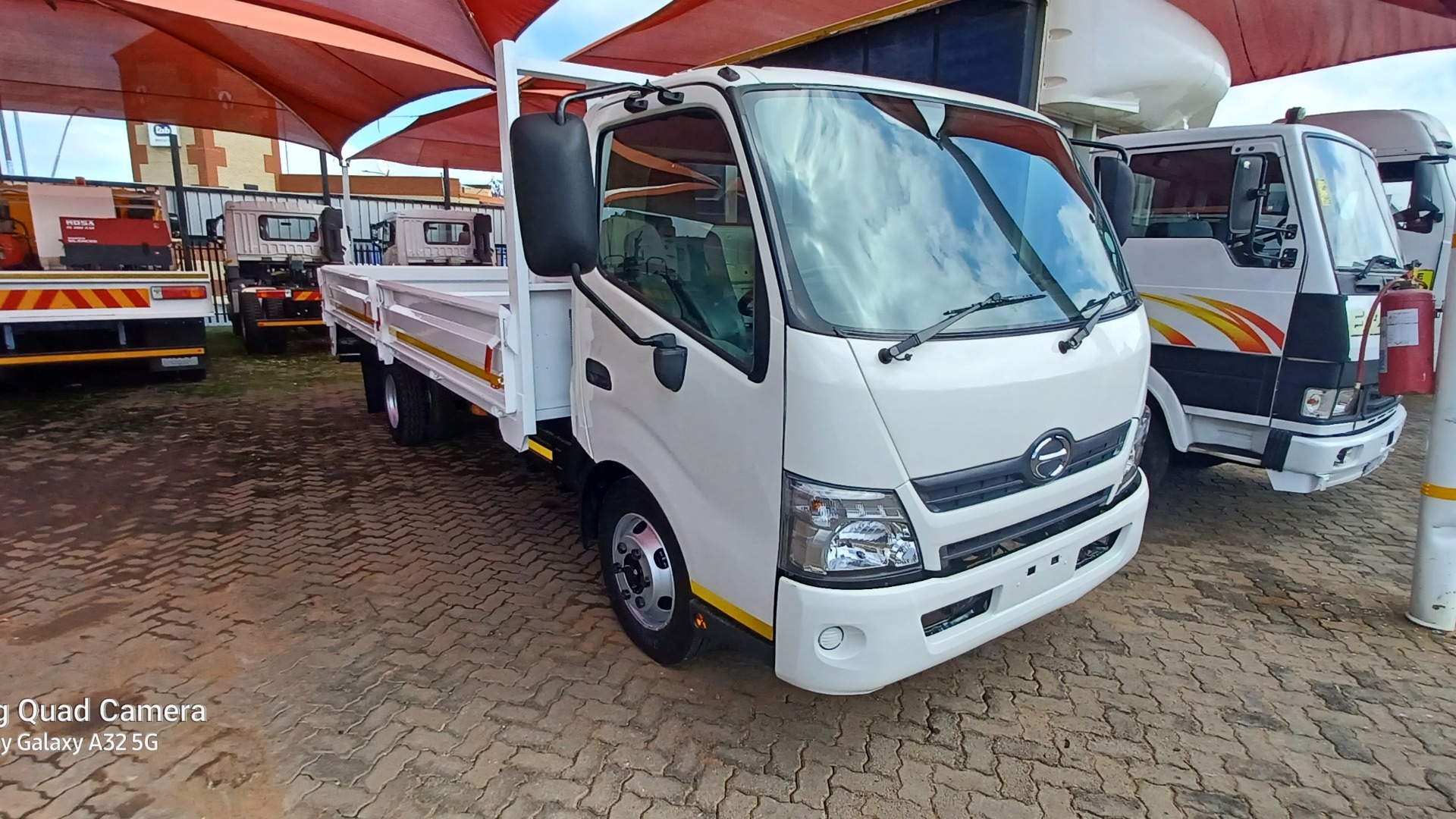 Hino Dropside trucks Used HINO 300 4 ton dropside AUTOMATIC 2014 for sale by FAW Newlands   | Truck & Trailer Marketplace