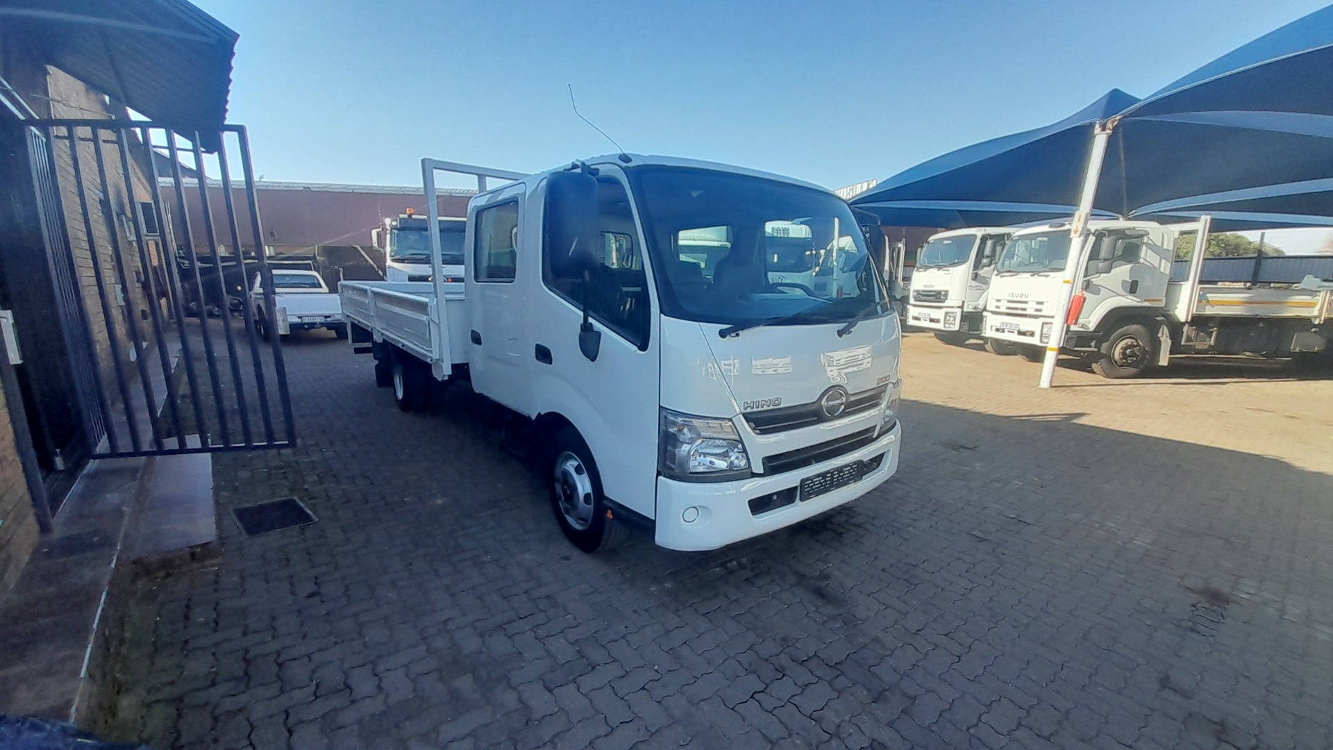 Hino Dropside trucks Used HINO 300 Double Cab 5 ton dropside 2017 for sale by FAW Newlands   | Truck & Trailer Marketplace