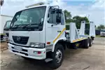 Flatbed Trucks Nissan UD 90 FLATDECK with hydraulics winch and ra 2015