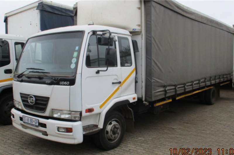 Nissan Curtain side trucks NISSAN UD60 WITH 7 .2 M TAUTLINER 2015