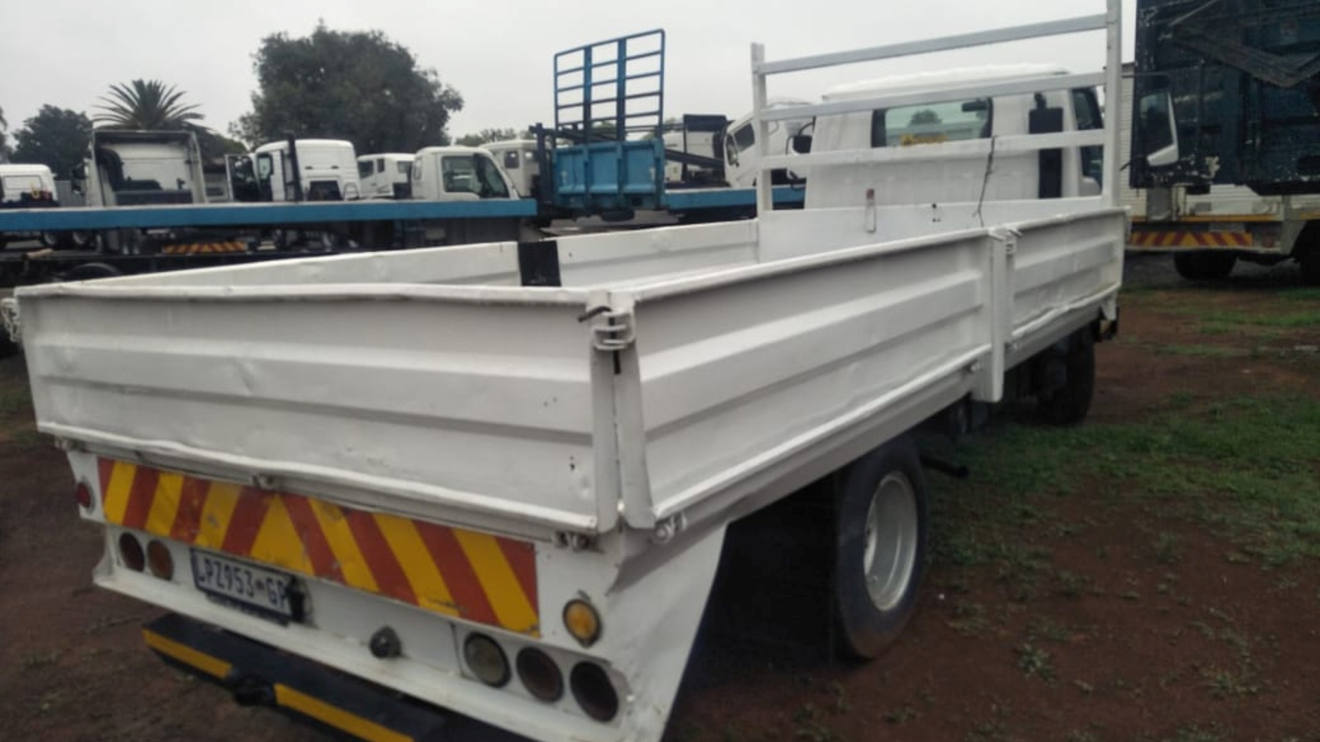 Isuzu Dropside trucks 3.5 TON DROPSIDE 2000 for sale by MT Car and Truck Auctioneers | Truck & Trailer Marketplace