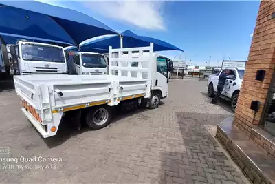 Dropside Trucks 2010 ISUZU NPR 150 2 ton dropside 2010