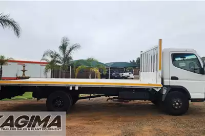 Fuso Flatbed trucks Canter FE7 136 Flat Deck 2010 for sale by Kagima Earthmoving | Truck & Trailer Marketplace