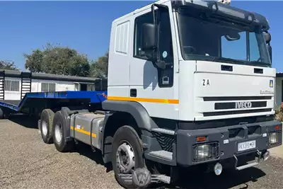 Iveco Truck tractors EuroTrakker 6x4 2002 Busaf 14m Step Deck Combo 2003 for sale by Wolff Autohaus | Truck & Trailer Marketplace
