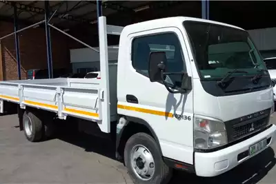 Fuso Dropside trucks Canter FE 7 136 F/C Dropside LWB 2018 for sale by McCormack Truck Centre | Truck & Trailer Marketplace