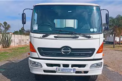 Hino Dropside trucks HINO 17 257 6X2 TAG AXLE DROPSIDE 2006 for sale by Country Wide Truck Sales | Truck & Trailer Marketplace