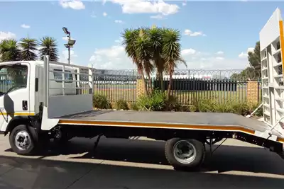 Isuzu Flatbed trucks NPR400 AMT Flatbed Body with Hydraulic Ramp 2019 for sale by McCormack Truck Centre | Truck & Trailer Marketplace