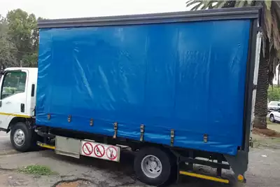 Isuzu Curtain side trucks NPR400 4 Ton Curtian Side with Internal Drop Sides 2010 for sale by Trans African Motors | Truck & Trailer Marketplace