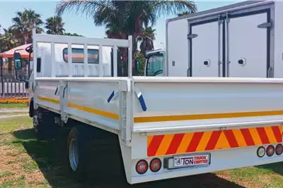 AMC Dropside trucks ISUZU NPR 300 DROPSIDES 2015 for sale by 4 Ton Trucks | Truck & Trailer Marketplace