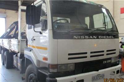 1996 Nissan  NISSAN CW290 DROPSIDE WITH FASSI 105 REAR MOUNT