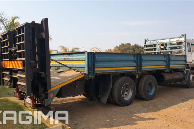 2012 Tata  1918 Dropsides with Hydraulic Ramps and Winch